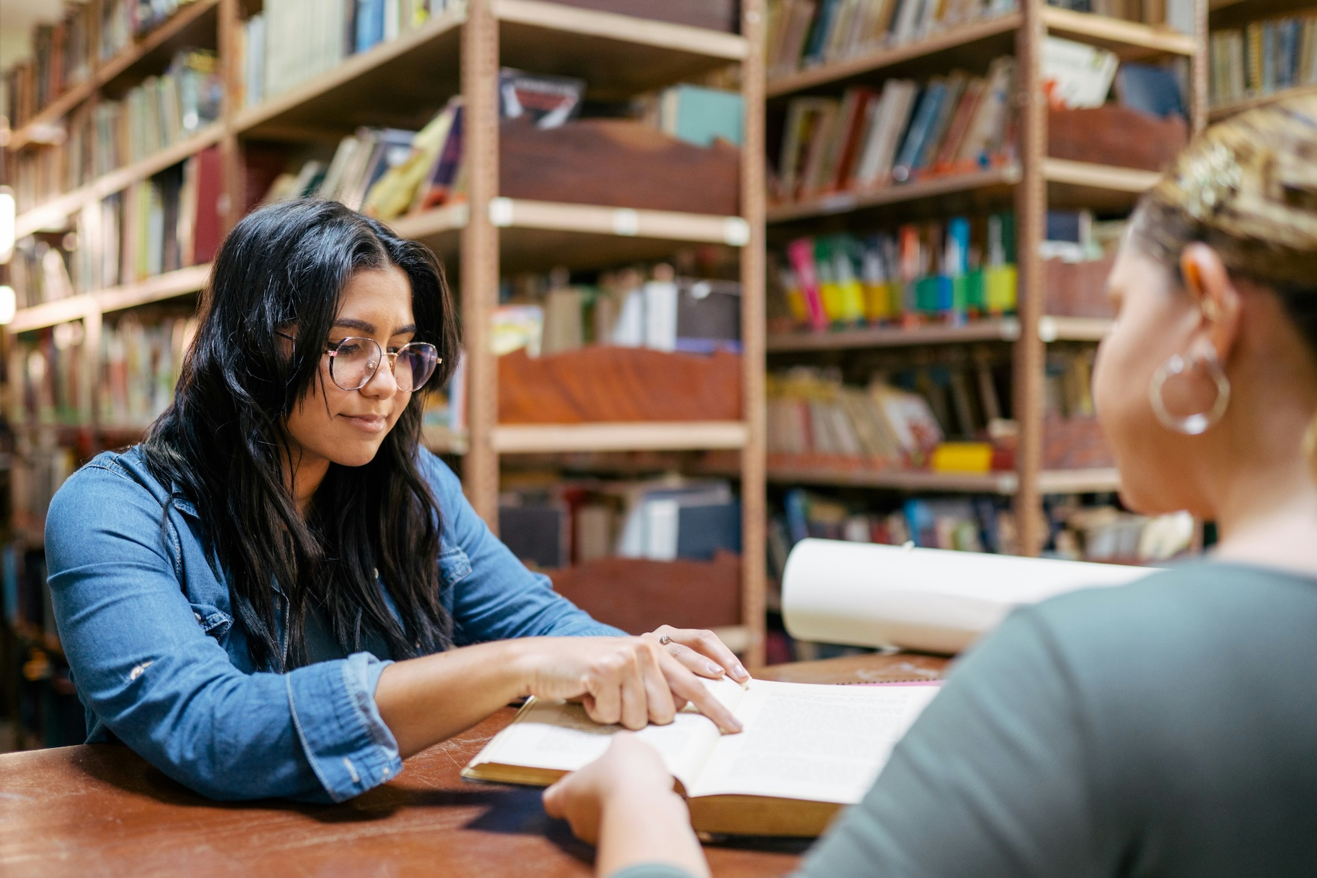 Student and mentor go over options at the library