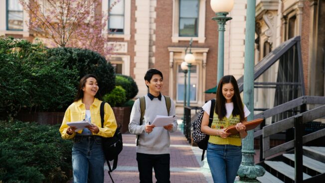 Students walking around university campus